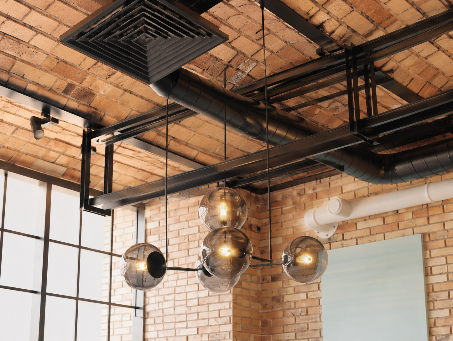 Concrete and blackened steel in an industrial interior