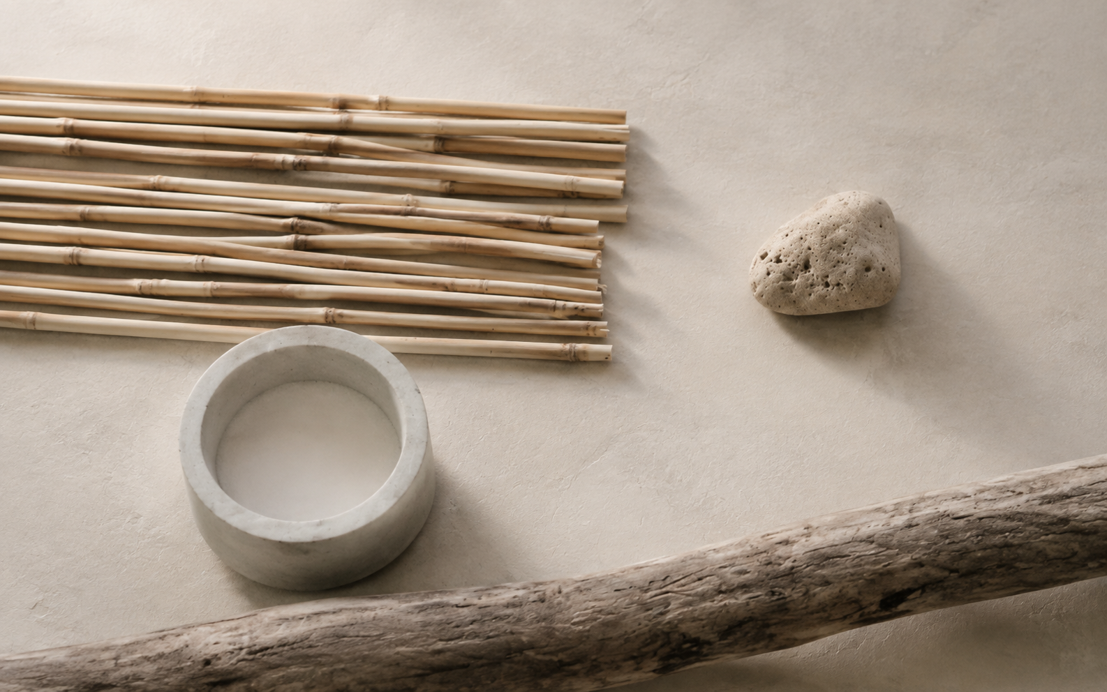 Natural wood, stone and handmade ceramic in a Japandi interior