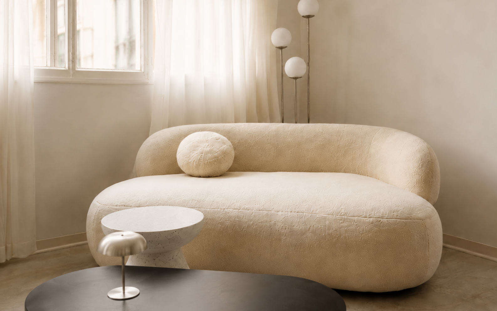 A sculptural chair in a quiet minimalist setting