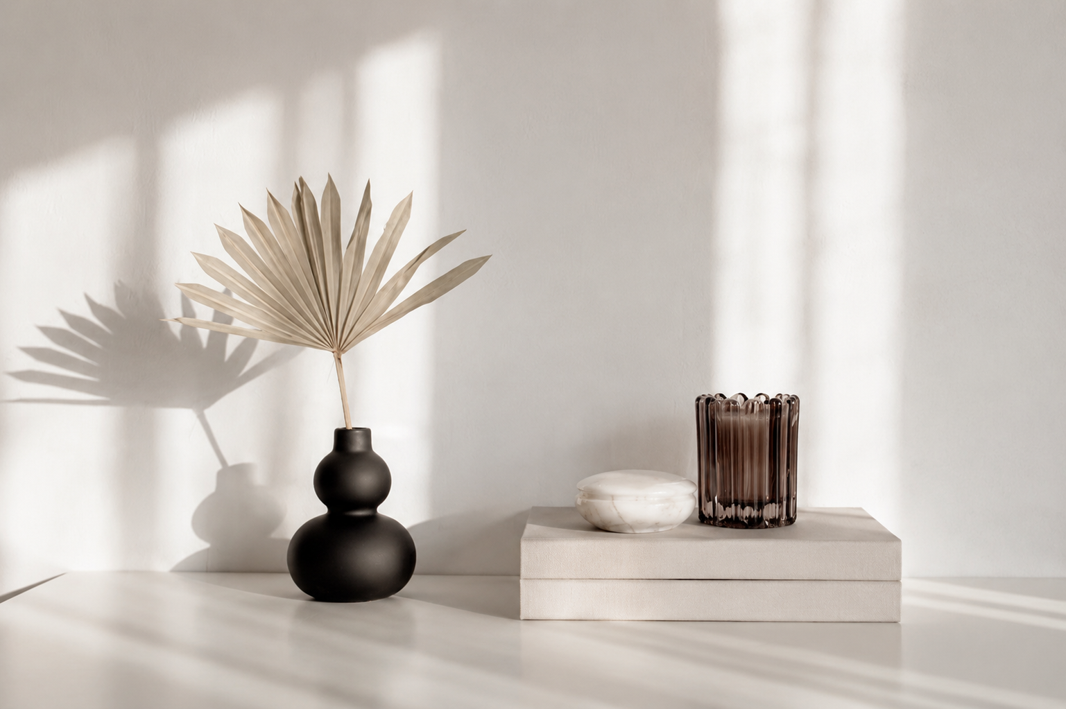 Soft natural light falling across a plaster wall