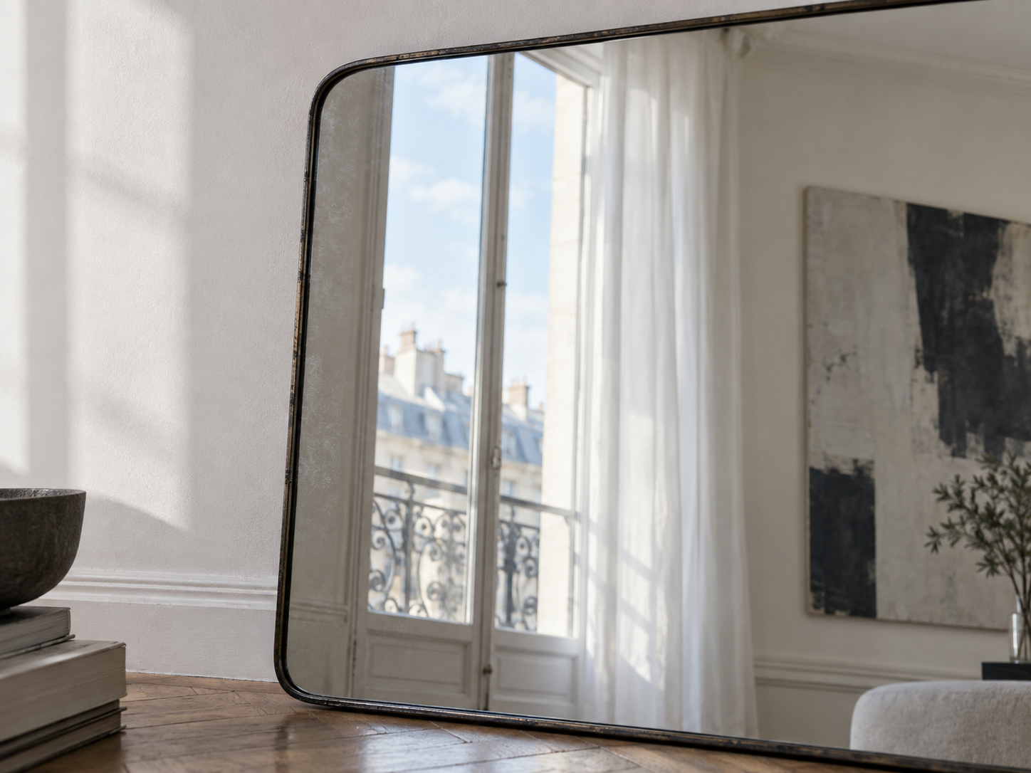 Soft window reflection in an aged mirror