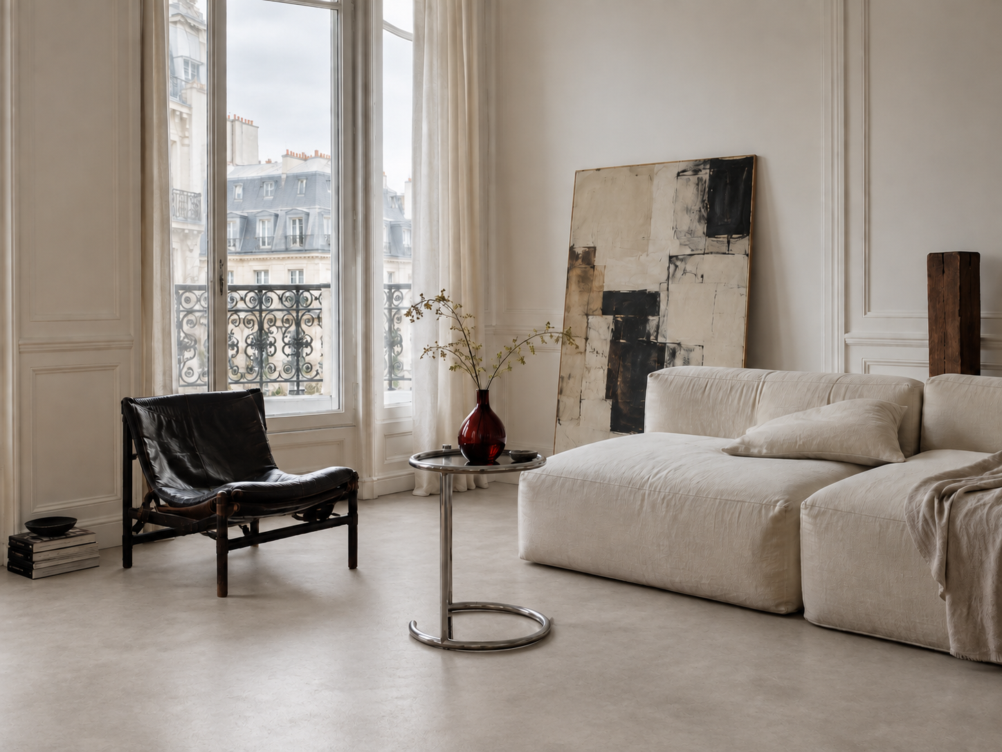Restrained modern furniture in a classical Parisian room
